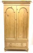 Victorian style pine double wardrobe with single drawer to base