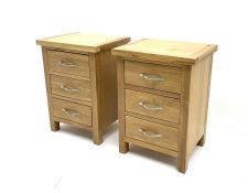 Pair light oak bedside pedestal chests