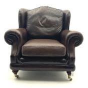 Thomas Lloyd - Traditional shape armchair uphlstered in brown leather