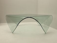 Contemporary curved and folded glass coffee table