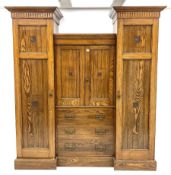 Late 19th/early 20th century oak drop centre wardrobe