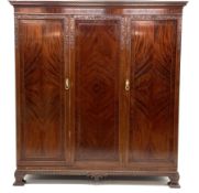 Early 20th century mahogany seven piece bedroom suite - triple wardrobe with projecting cornice of f