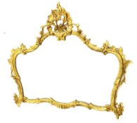 Classical ornate gilt framed shaped wall mirror