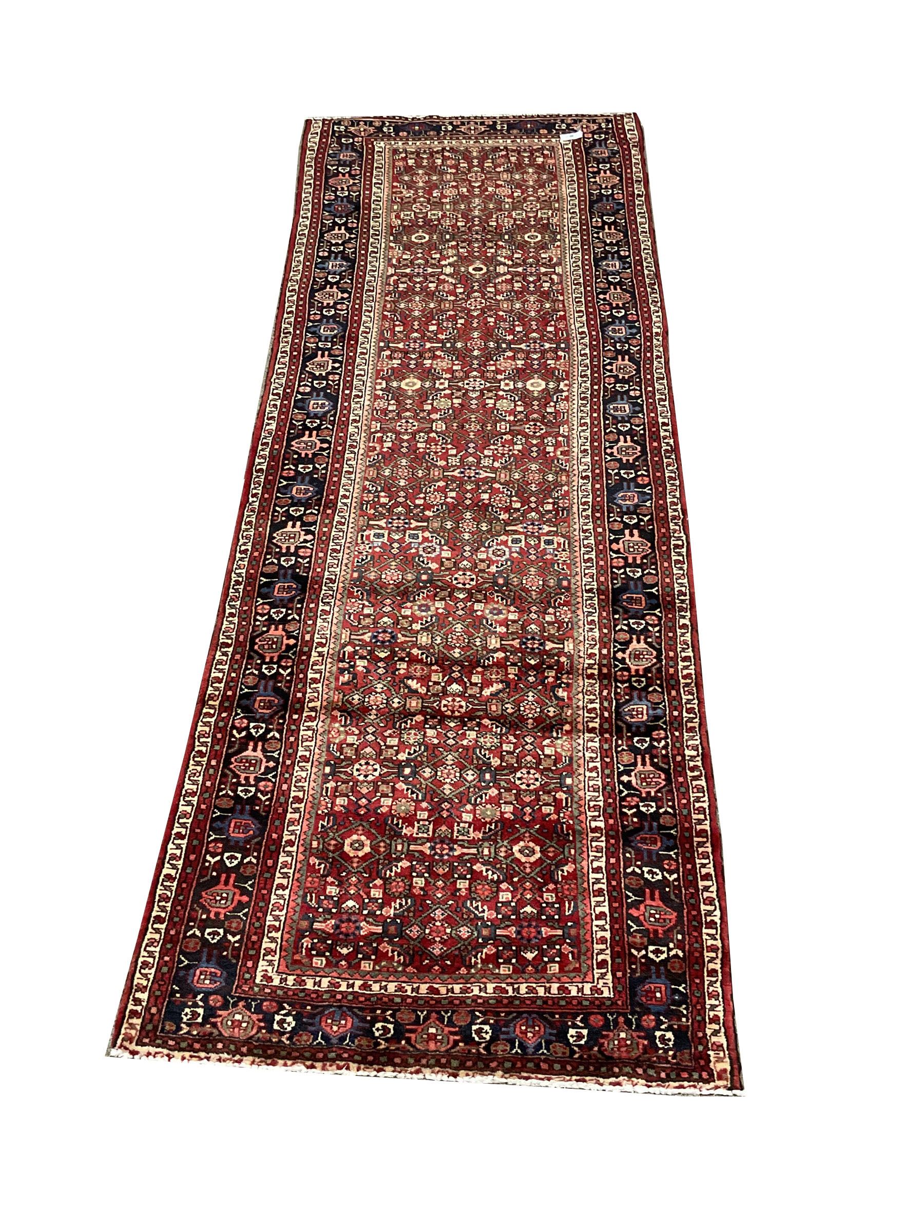 Persian red ground rug