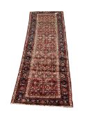 Persian red ground rug