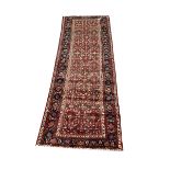 Persian red ground rug