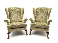 Pair Parker Knoll mid 20th century classic wing back armchairs