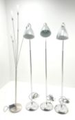 Four chrome metal standard lamps