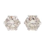 Pair of platinum round brilliant cut diamond stud earrings