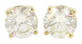 Pair of 18ct gold round brilliant cut diamond stud earrings