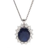 18ct white gold oval sapphire and round brilliant cut diamond pendant necklace