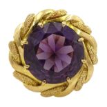 18ct gold circular purple stone ring