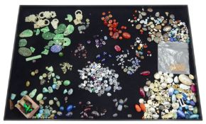 Collection of loose gemstones including four cabochon sapphires