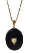 Victorian gold mounted black enamel mourning picture back pendant