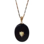 Victorian gold mounted black enamel mourning picture back pendant