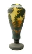 Reproduction Daum Nancy art nouveau style overlay and cut glass vase in ovoid form with a circular