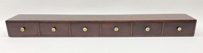 Early 19th century mahogany table top six drawer chest