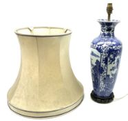 A Chinese blue and white table lamp