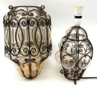 Continental glass ceiling light encased in an iron frame with scroll design H35cm