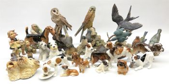 Various figures of animals to include examples of dogs by Royal Doulton and birds by Border Fine art