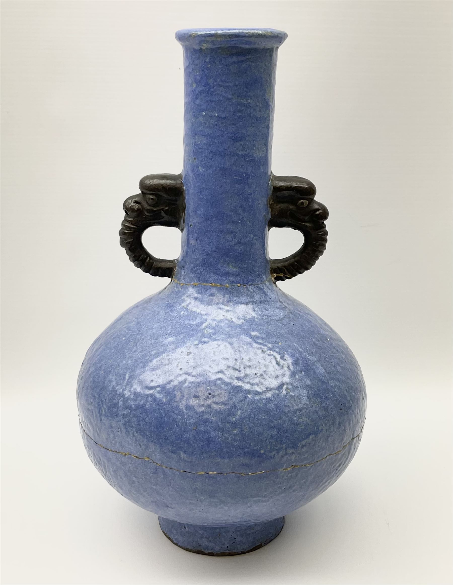 20th Century Chinese blue glazed twin handled vase with orange peel finish