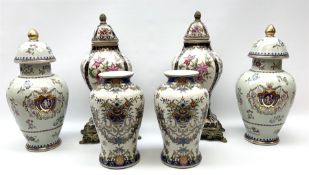 Pair ceramic urns and covers with gilded finials