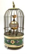 Automation bird cage of predominantly brass construction with central rotating orb and two birds wit