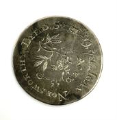 King William III half crown coin with engraving to the reverse reading 'Joan Norsworthy