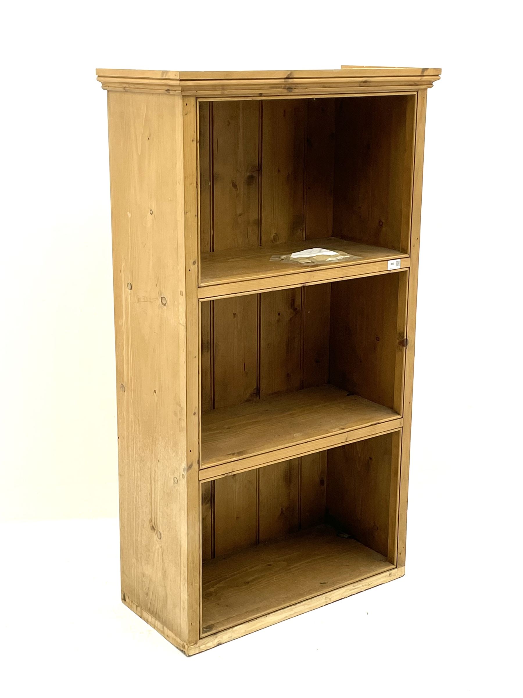 Small wall mounted pine bookcase