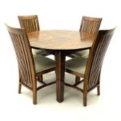 Circular hardwood extending dining table (H78cm