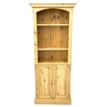 Narrow pine bookcase