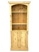 Narrow pine bookcase