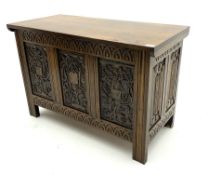 Mid to late 20th century carved panelled oak coffer