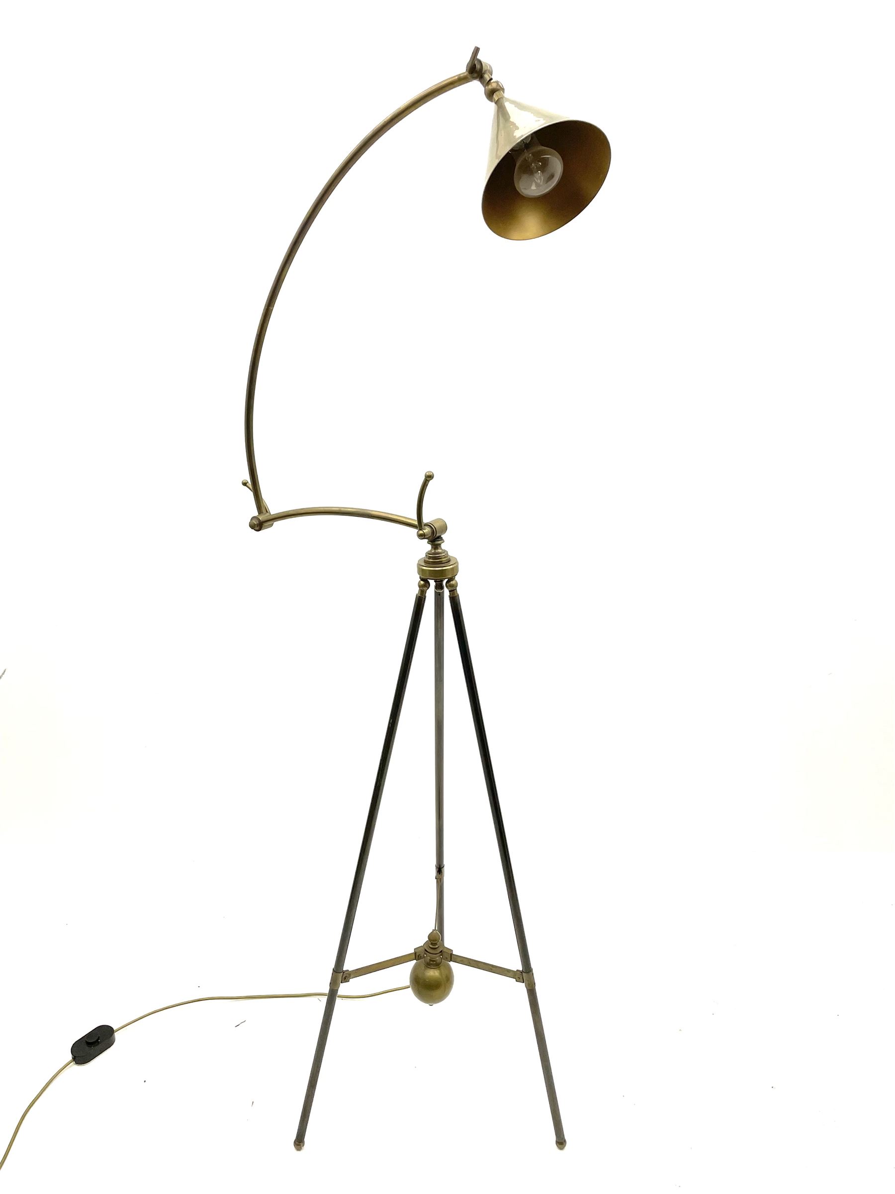 Contemporary brass and bronze finish adjustable floor standing lamp