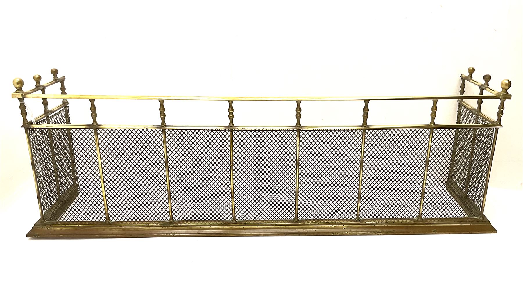 Late 19th century brass and mesh fender