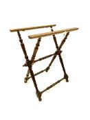 Late 19th century turned fruitwood and elm folding luggage stand and a folding stand