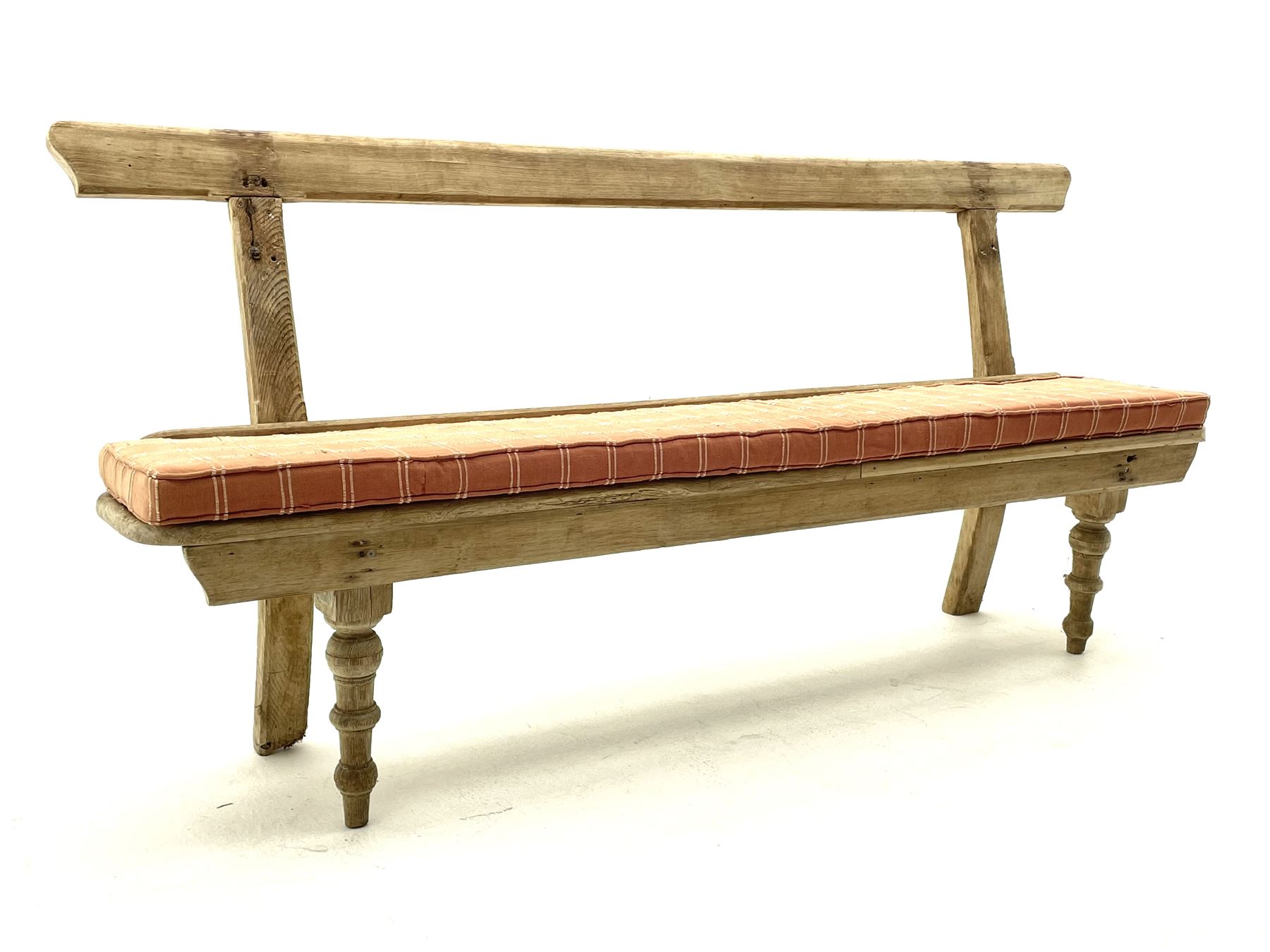 Rustic stripped pine bench with seat pad