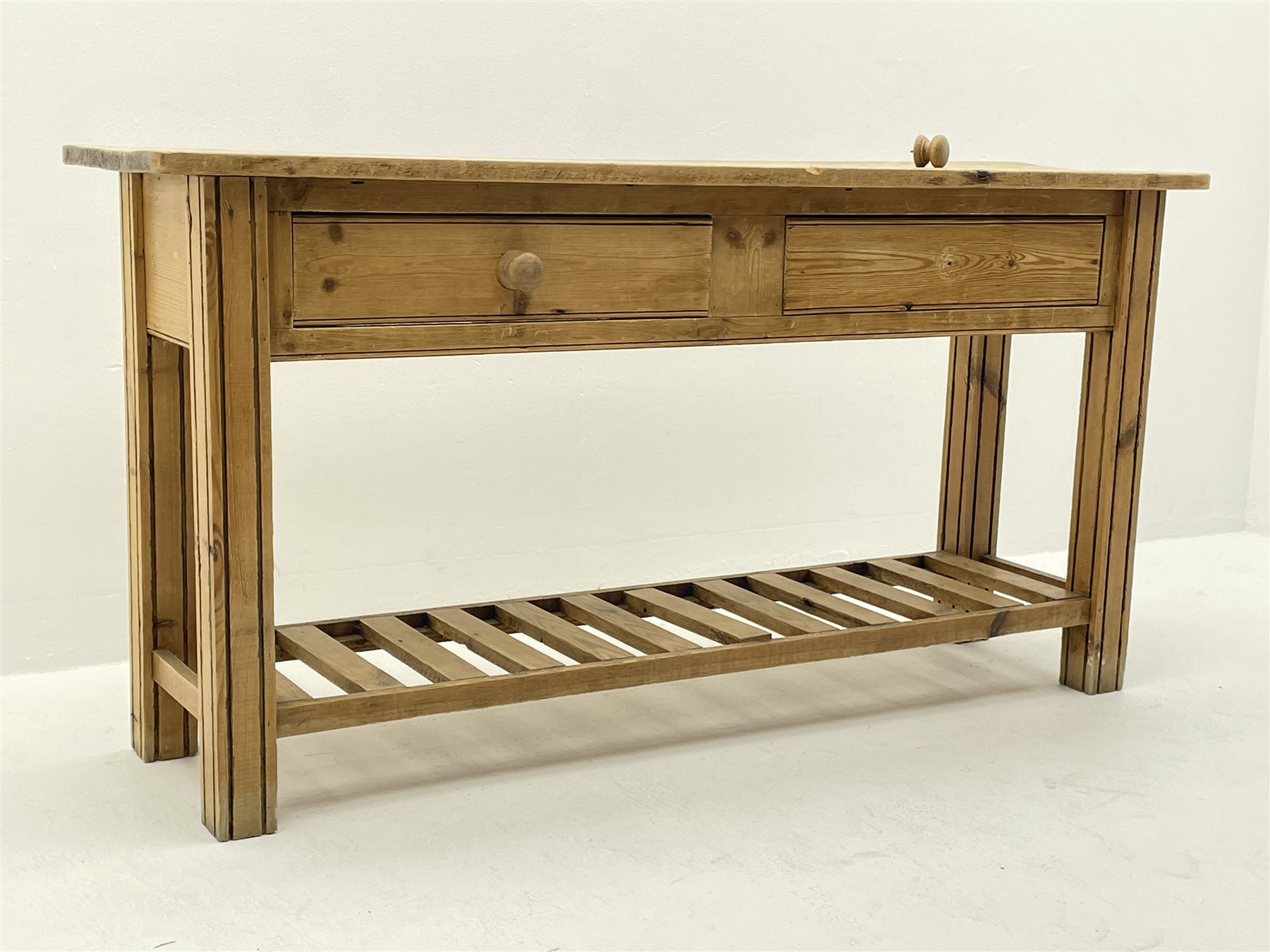 Traditional pine two drawer dresser with potboard base