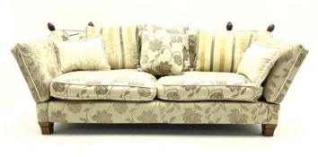 Grande Knole drop arm three seat sofa upholstered in pale fabric with raised floral pattern