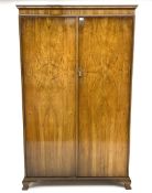 Waring and Gillow - early to mid 20th century figured walnut Gentleman�s wardrobe