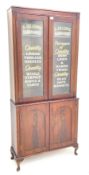 19th century mahogany bookcase on cupboard