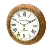 Late 19th century circular wall clock in stained beech case by �Aldred & Sons