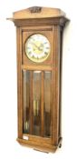 Early 20th century oak cased wall clock