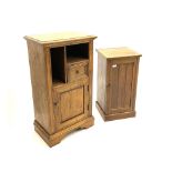 Narrow oak cabinet fitted with compartments