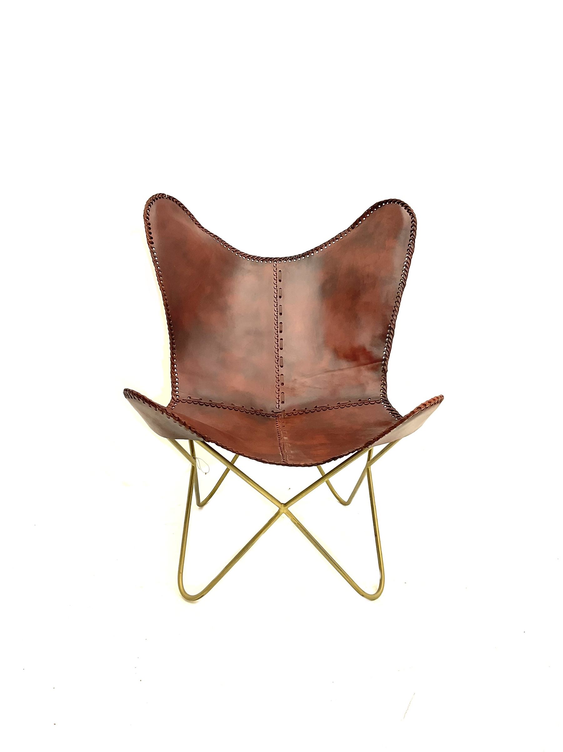 Leather sling chair over metal frame