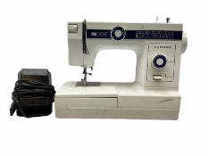 Janome model 110 sewing machine (not tested).