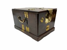 Chinese brass bound hardwood travelling vanity box of oblong form with side carrying handles