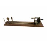 19th/ early 20th century brass and oak yarn twist tester
