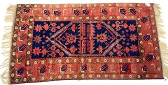 Persian red ground rug