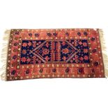 Persian red ground rug